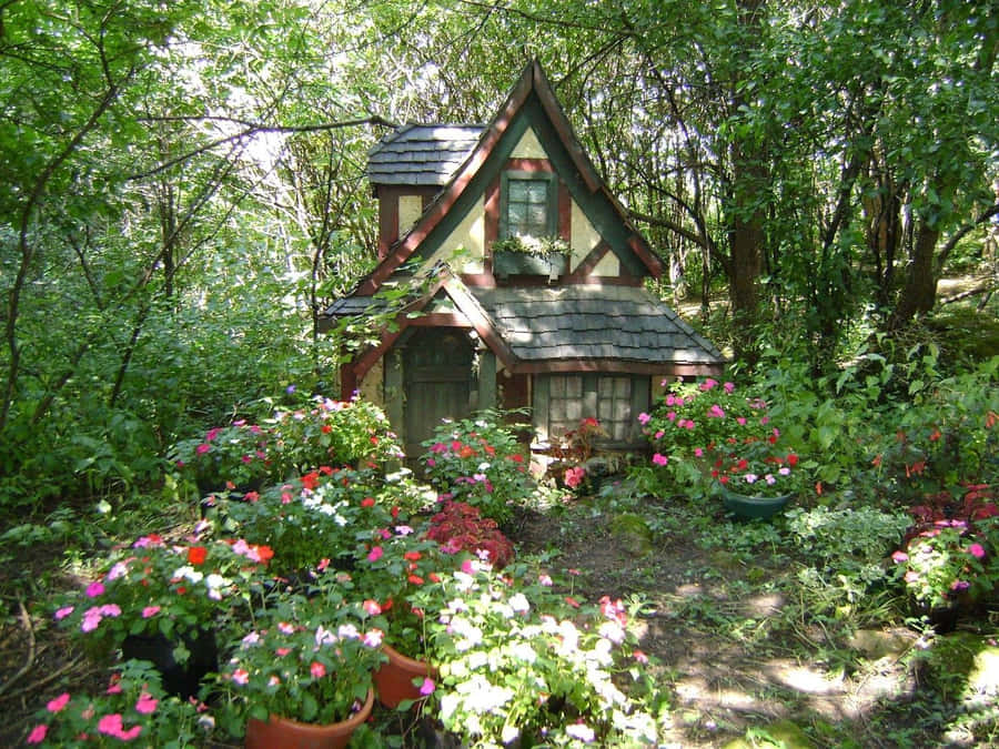 Enchanting Cottage Garden In Full Bloom Wallpaper