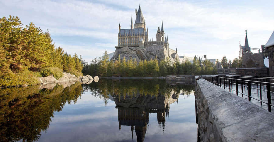 Enchanting Evening At Hogsmeade Village Wallpaper