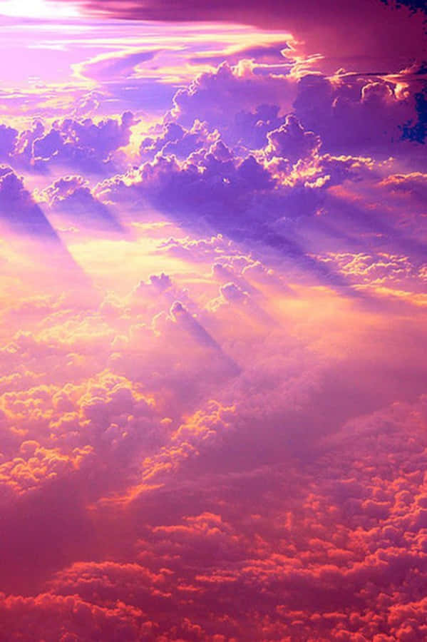 Enchanting Pink Sky At Sunset Wallpaper