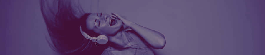 Endless Blue Sky Above A Scenic Landscape Of Mountains And Meadows. Wallpaper