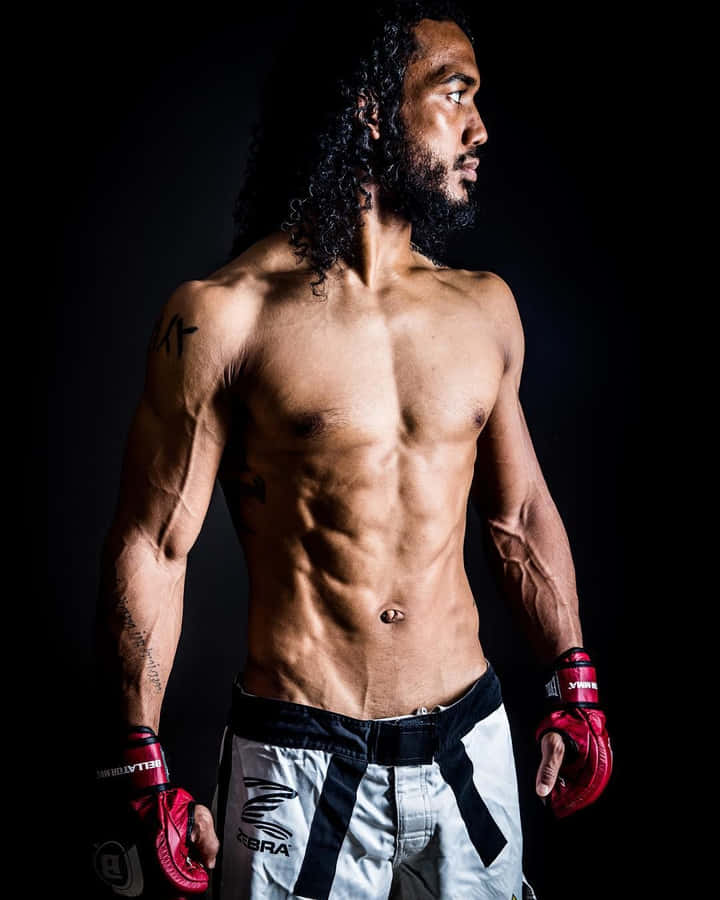 Energetic American Mma Star Ben Henderson In Action. Wallpaper
