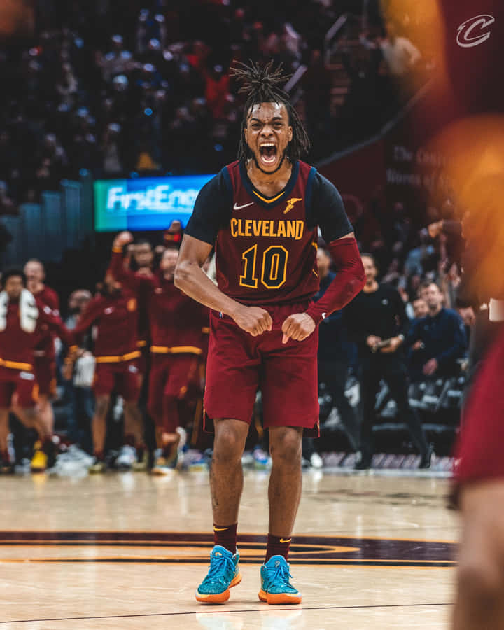 Energetic Basketball Player Celebration Wallpaper