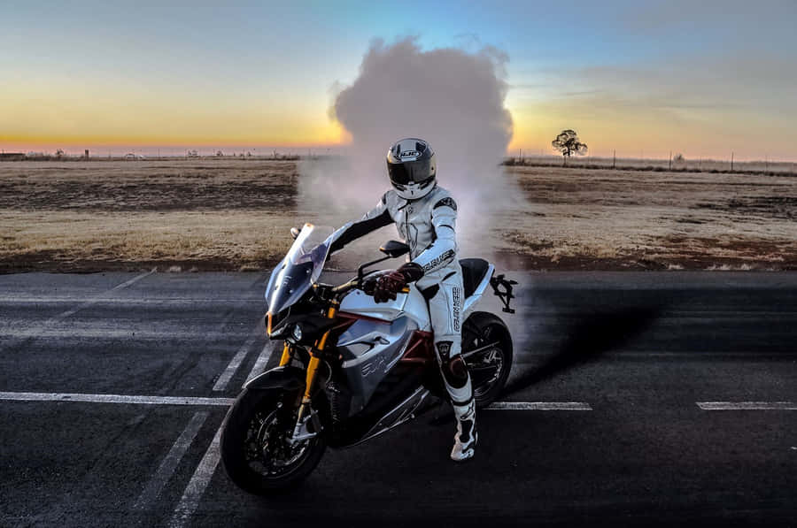 Energica Electric Motorcycle In Action Wallpaper