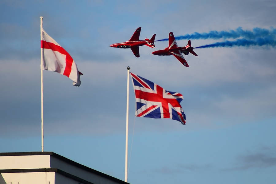 England Flag With Jet Plane Wallpaper