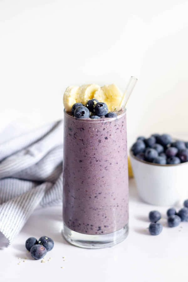 Enjoy A Refreshing And Healthy Blueberry Smoothie. Wallpaper