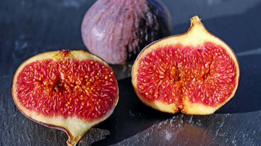 Enjoy An Abundance Of Nature's Sweetest Fruit: Purple Figs. Wallpaper