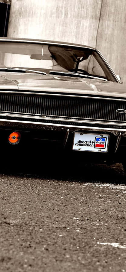 Enjoy An Adventure With A Classic Vintage Car - Perfect For An Iphone! Wallpaper