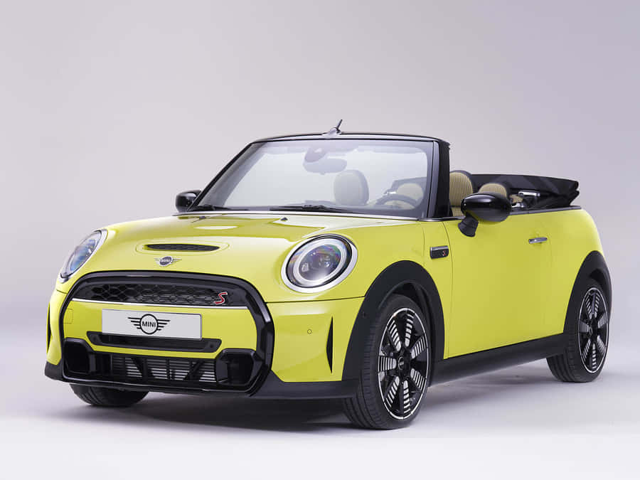 Enjoy An Open Sky Adventure With The Mini Cooper S Convertible Wallpaper
