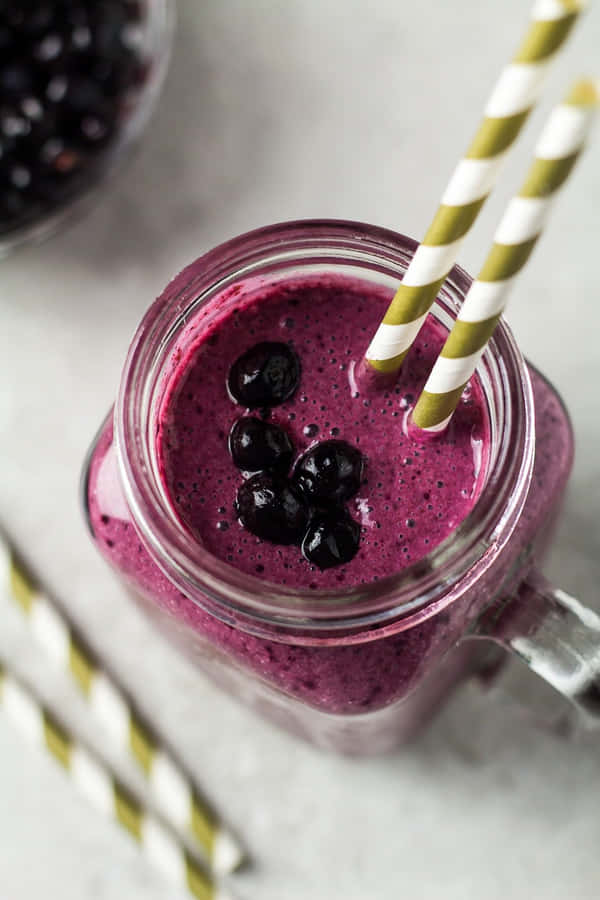 Enjoy Delicious Blueberry Smoothie Wallpaper