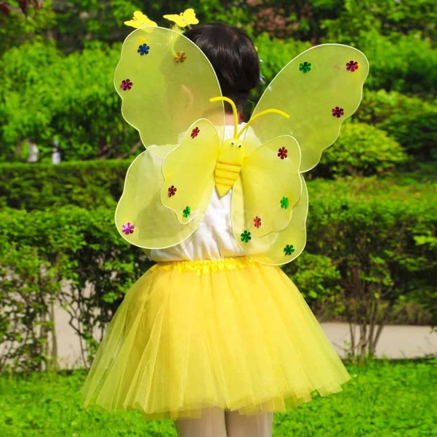 Enjoy The Beauty Of A Butterfly Fancy Dress Wallpaper