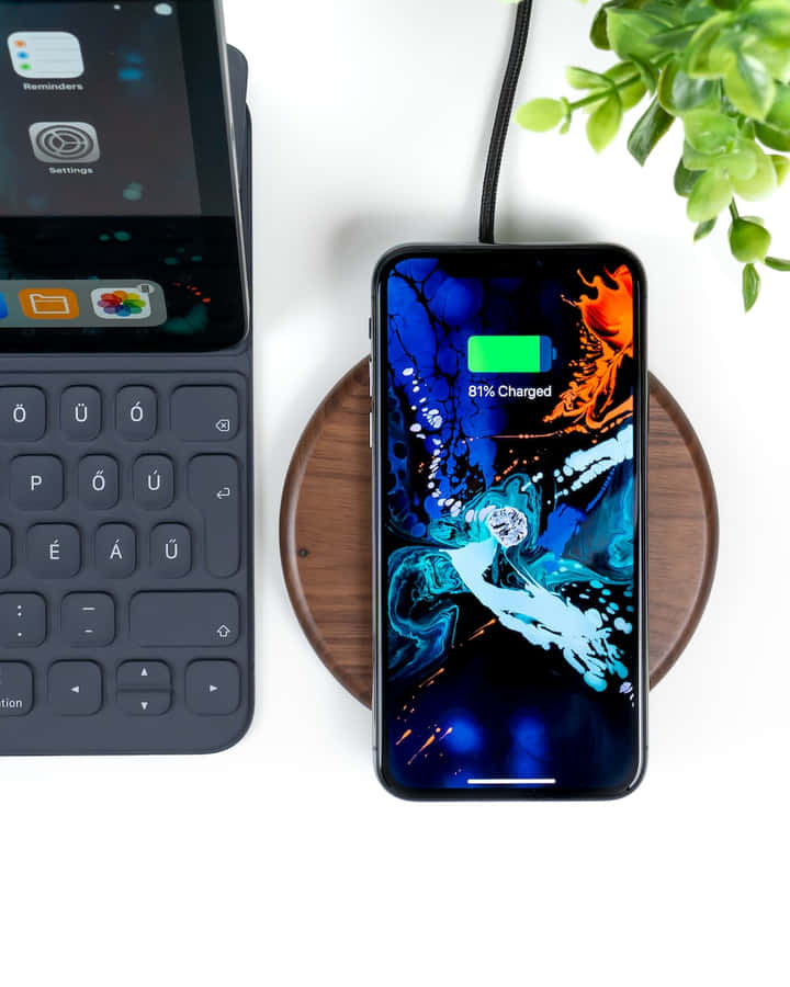 Enjoy The Convenience Of Wireless Charging Wallpaper