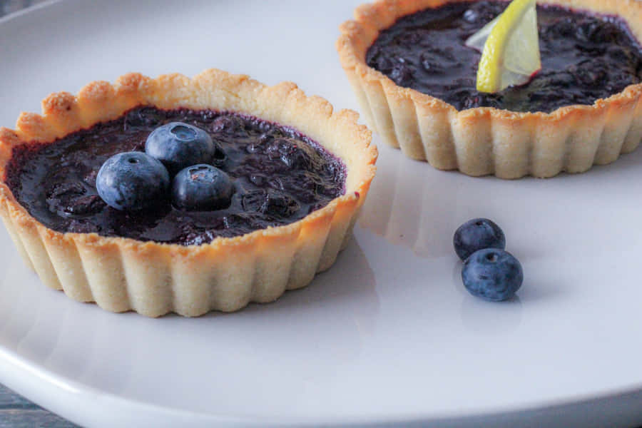 Enjoy The Delicious Taste Of Blueberry Tart Wallpaper