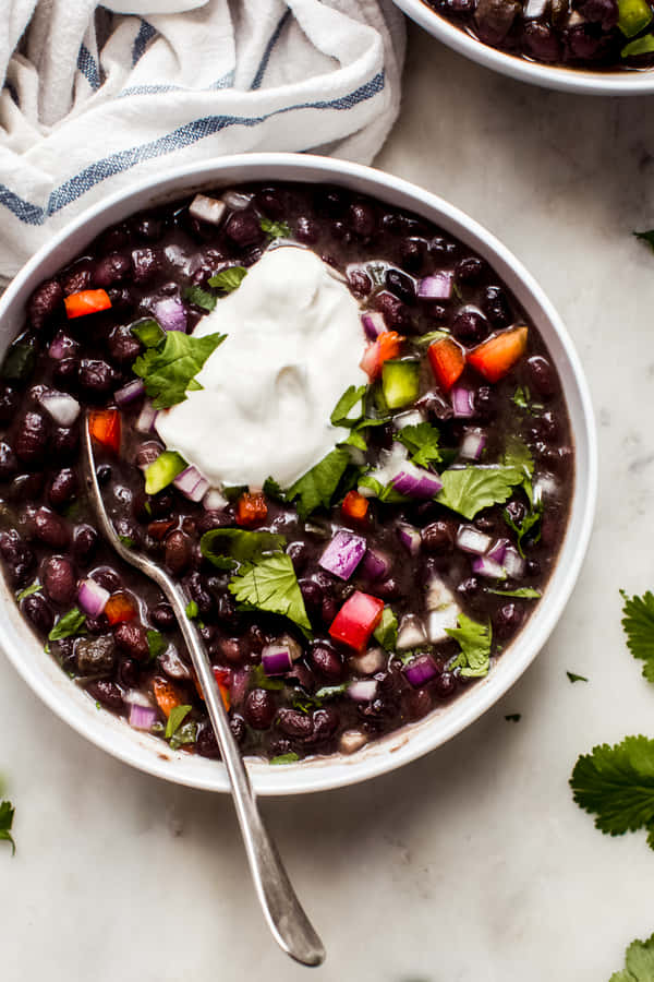 Enjoy The Deliciously Hearty Flavors Of Homemade Black Bean Soup. Wallpaper