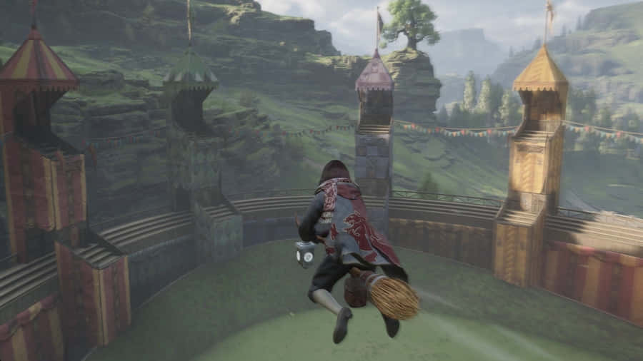 Enjoy The Magical Game Of Quidditch At The Hogwarts Pitch Wallpaper