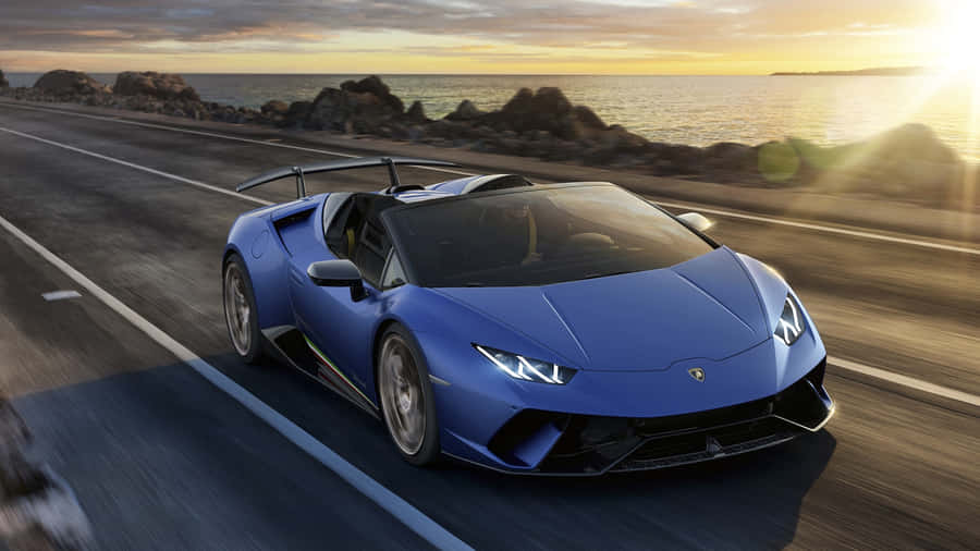 Enjoy The Ride In This Blue Car Wallpaper
