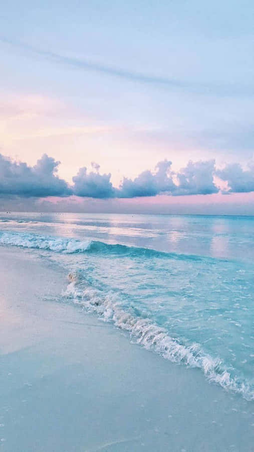Enjoying The Pastel Hued Beach Wallpaper