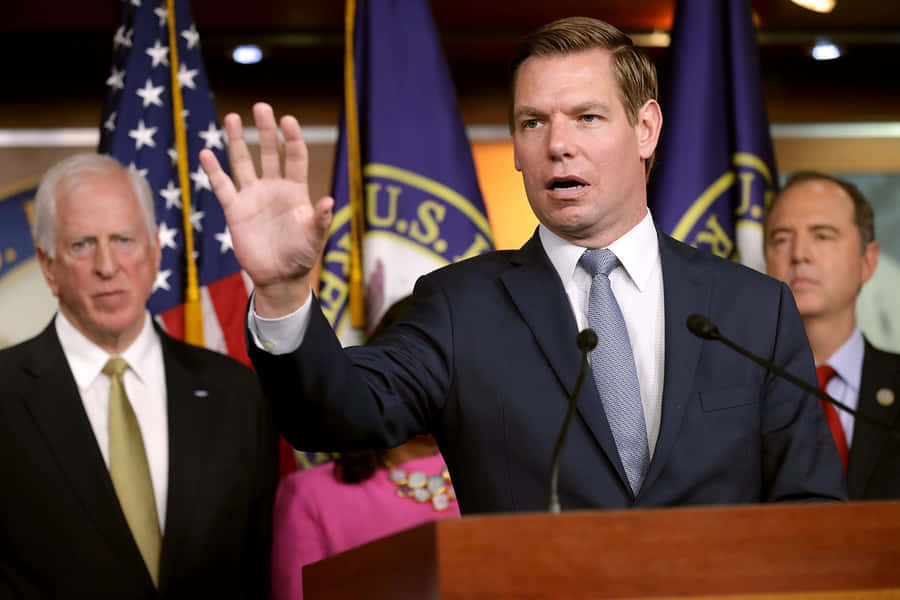 Eric Swalwell Speakingat Podium Wallpaper