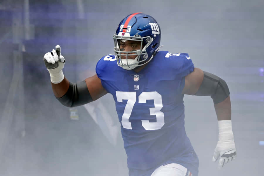 Evan Neal Team Defender Wallpaper