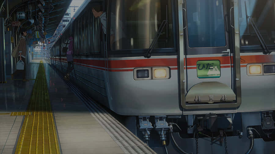 Evening Train Departure Scene Wallpaper