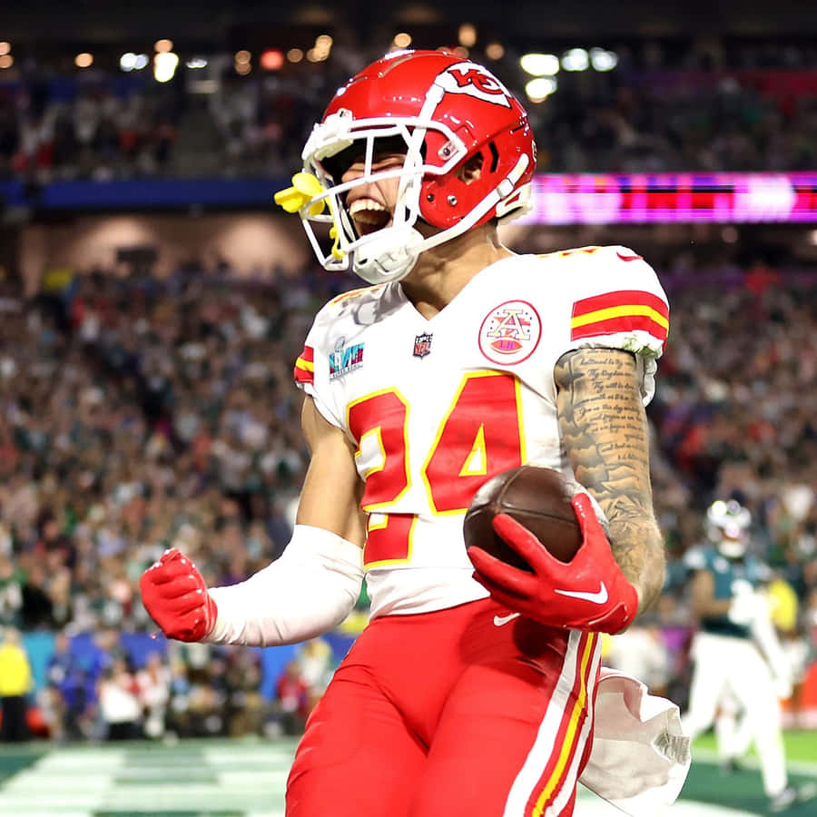 Excited Football Player Celebration Wallpaper