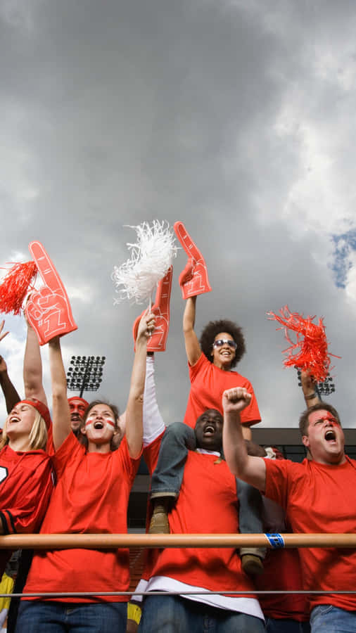 Excited Sports Fans Cheering Wallpaper