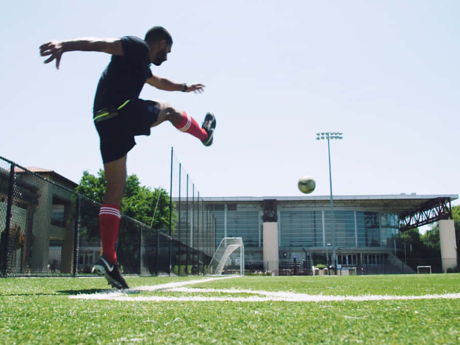 Exciting Corner Kick In Progress Wallpaper