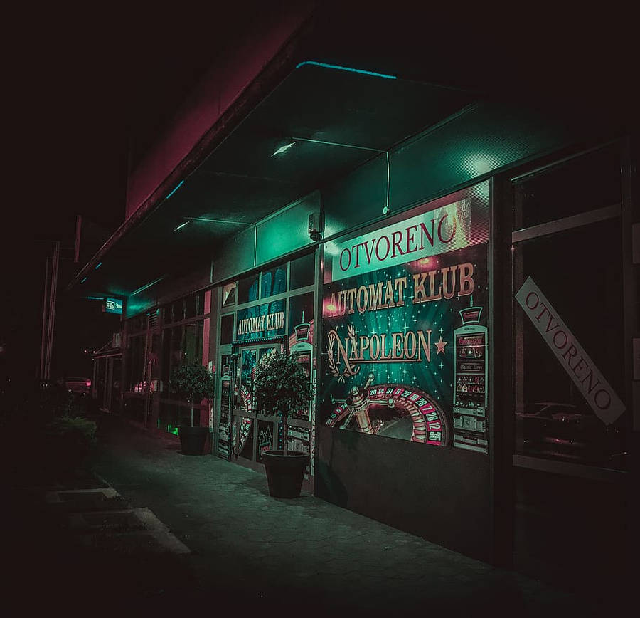 Expansive View Of A Vibrant Casino Floor Wallpaper