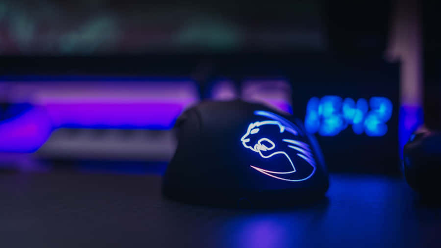 Experience Enhanced Gaming Performance With A Gaming Mouse Wallpaper