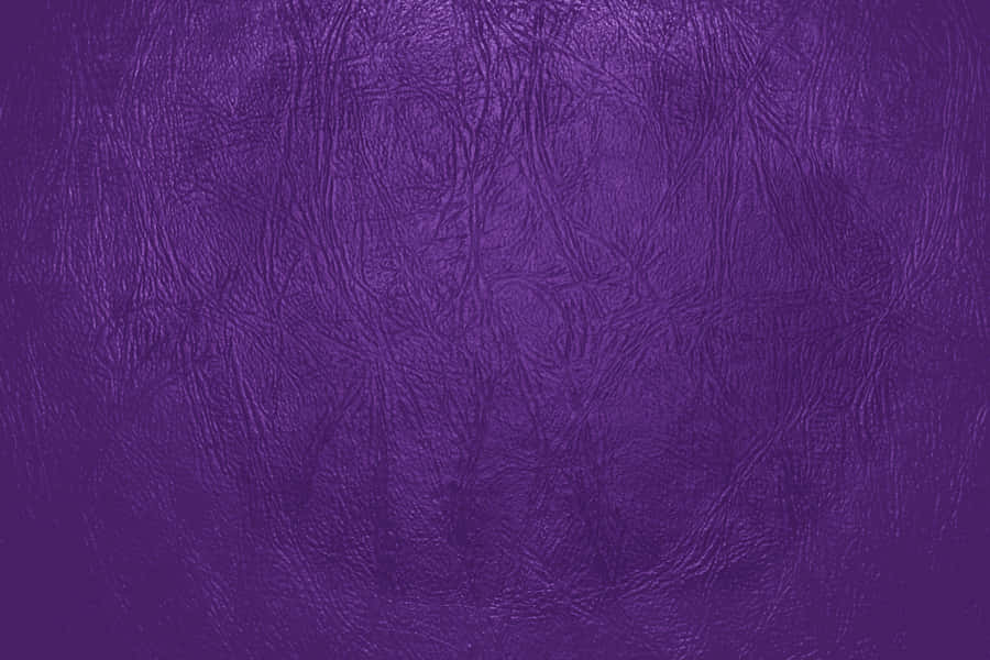 Experience Luxury With Purple Leather Wallpaper