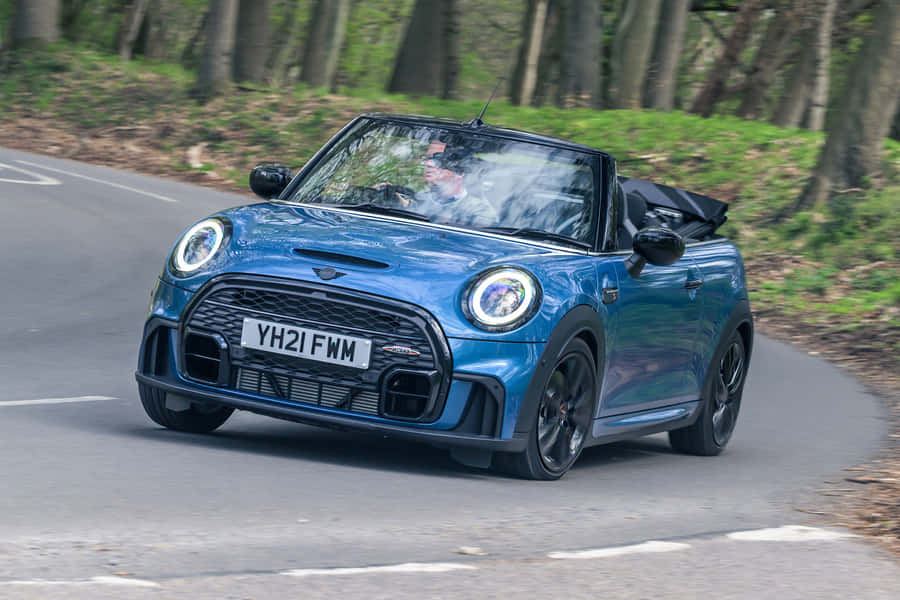 Experience The Open Road With A Mini Cooper S Convertible Wallpaper