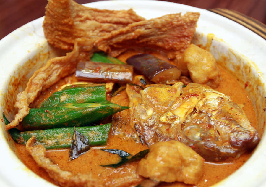 Experience The Taste Of Exquisite Red Snapper Fish Head Curry Wallpaper
