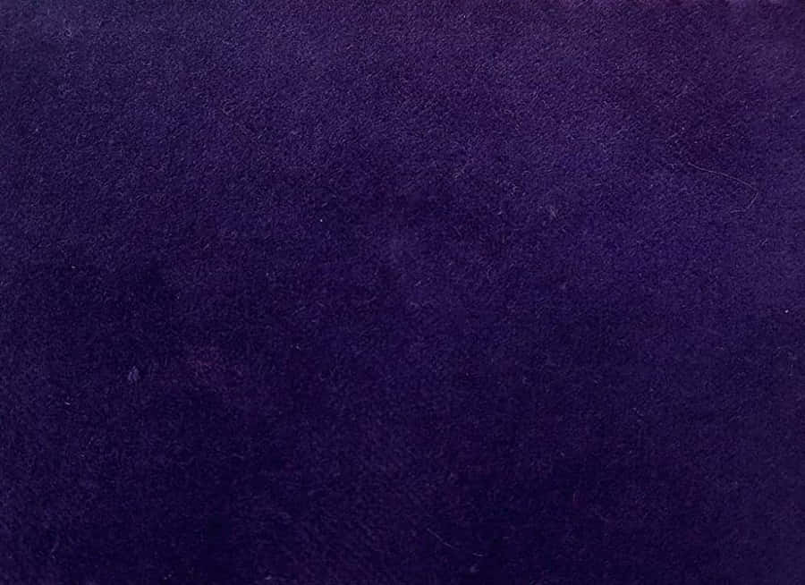 Explore Magnificent Patterns In Luxurious Purple Fabrics Wallpaper