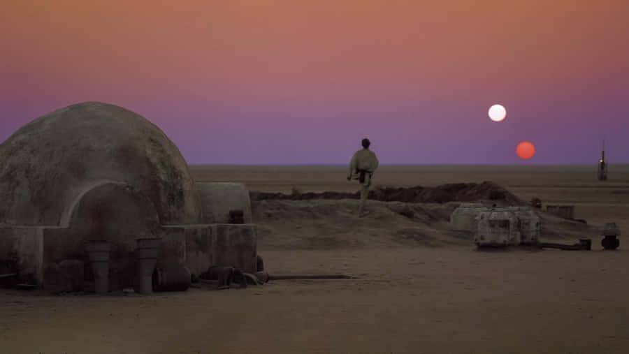 Explore The Desert Planet Of Tatooine Wallpaper