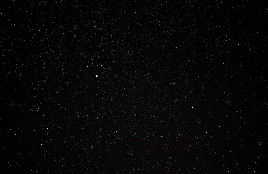 Explore The Infinite Possibilities Of The Mysterious Black Space Wallpaper