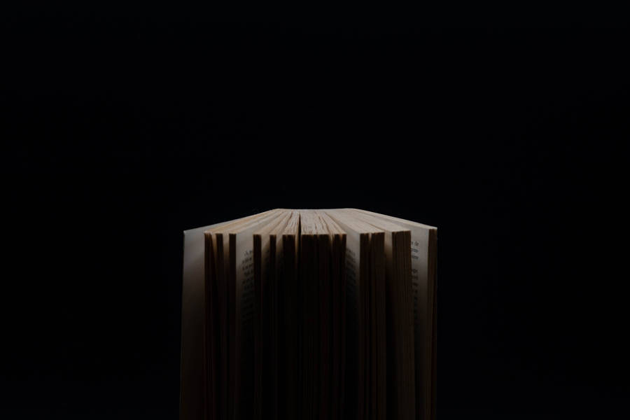 Explore Your Imagination Through The Words Of A Book Wallpaper