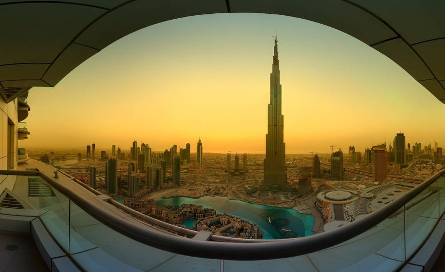 Exquisite Sunrise Reflected In Burj Khalifa Wallpaper