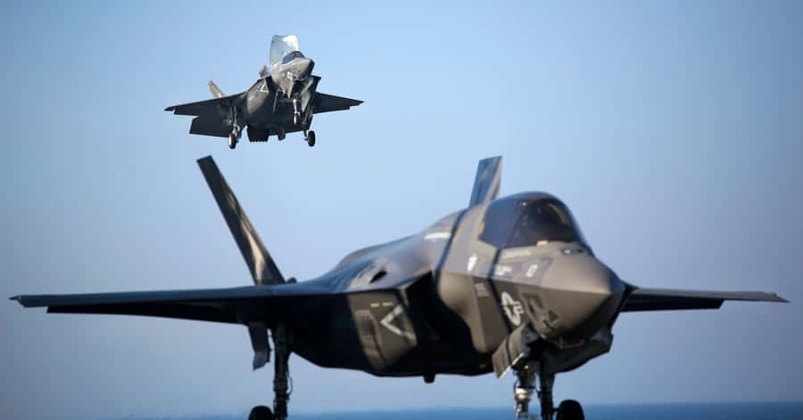 F35 Jet Hoveringand Landing Wallpaper