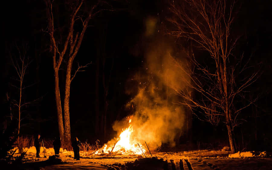 Fall Bonfire Under A Starry Sky Wallpaper