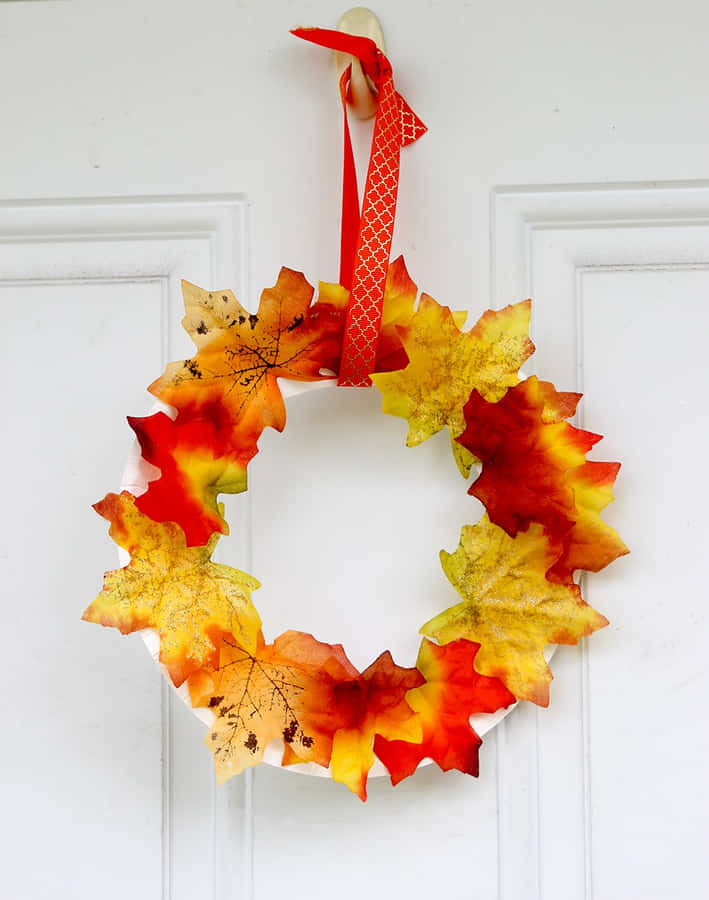 Fall Wreath - A Vibrant Welcome To The Season Wallpaper