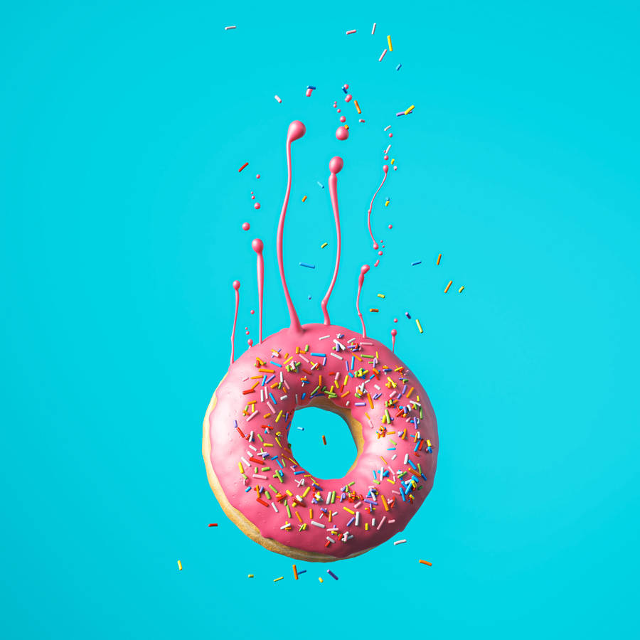 Falling Pink Donut Wallpaper