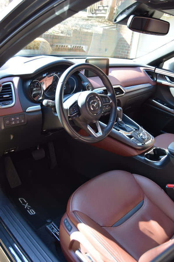Family On A Road Trip In A Stylish Family Car Wallpaper