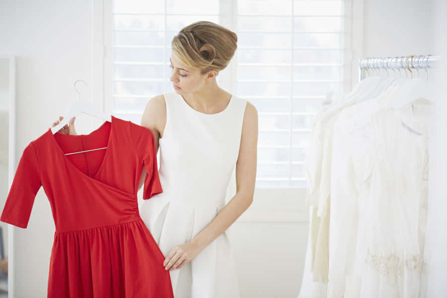 Fashionable Woman In Red Outfit Wallpaper