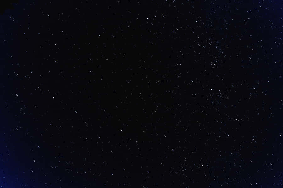 Feel The Calm And Captivating Night Sky Wallpaper