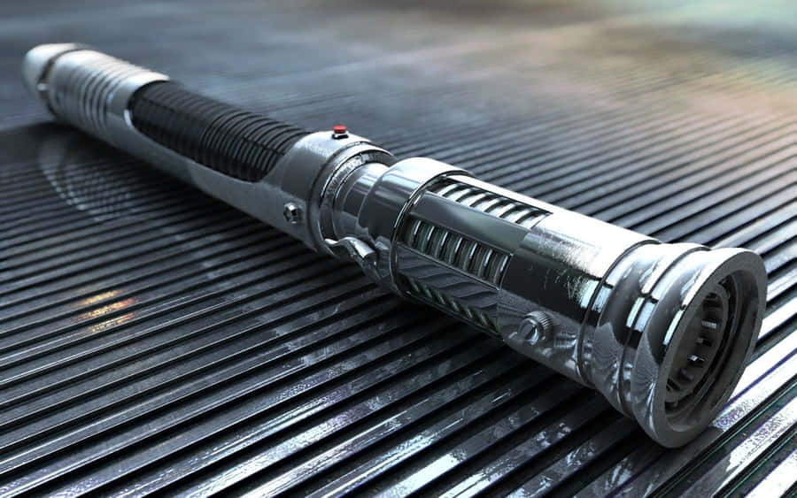 Feel The Power Of The Force With A Lightsaber In Your Hand Wallpaper