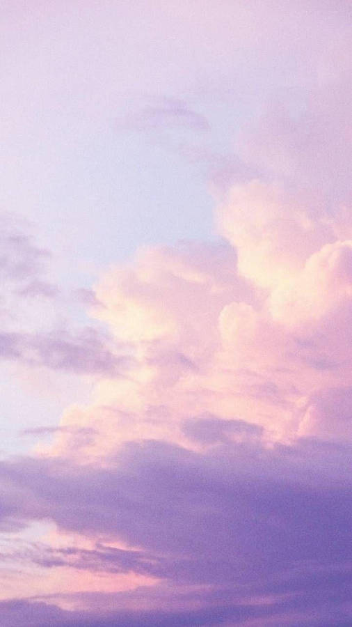 Feel The Purple Hues Of The Clouds Wallpaper