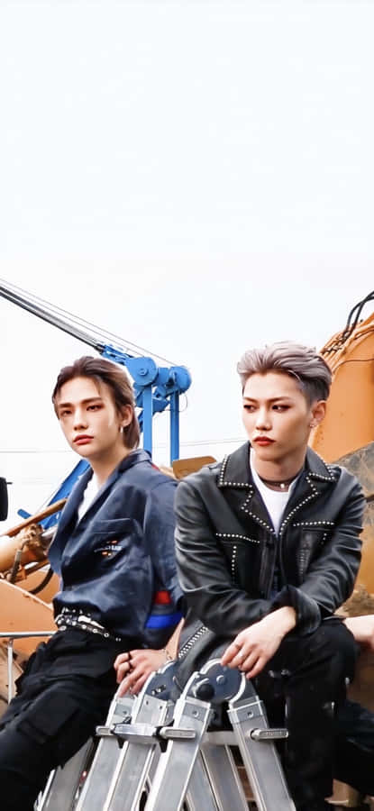Felix From Stray Kids Looks Confident And Ready For Their Next Adventure. Wallpaper