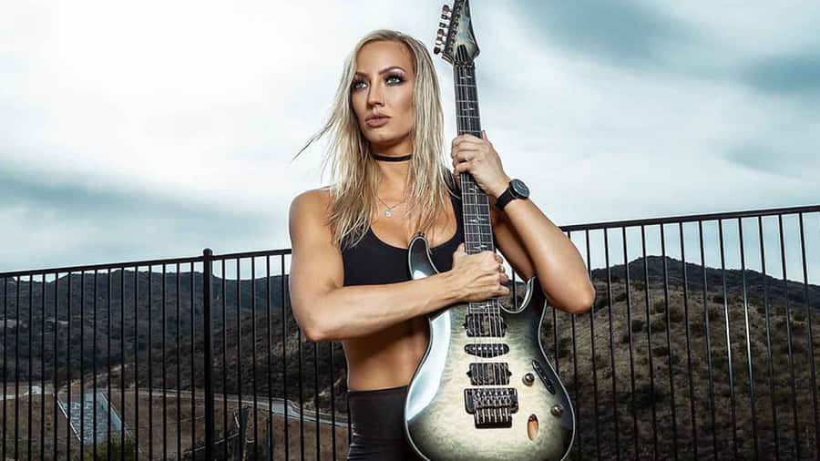 Female Guitarist Outdoor Portrait Wallpaper