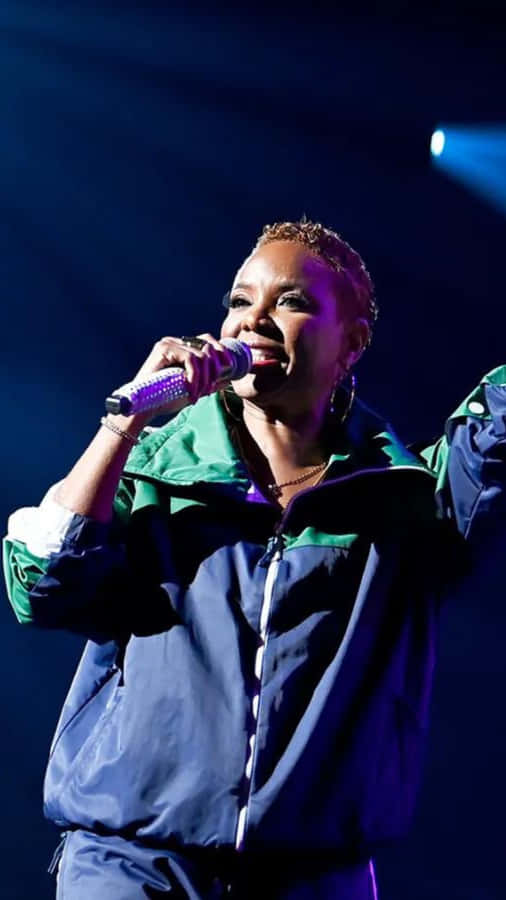 Female Hip Hop Artist Performing Live Wallpaper