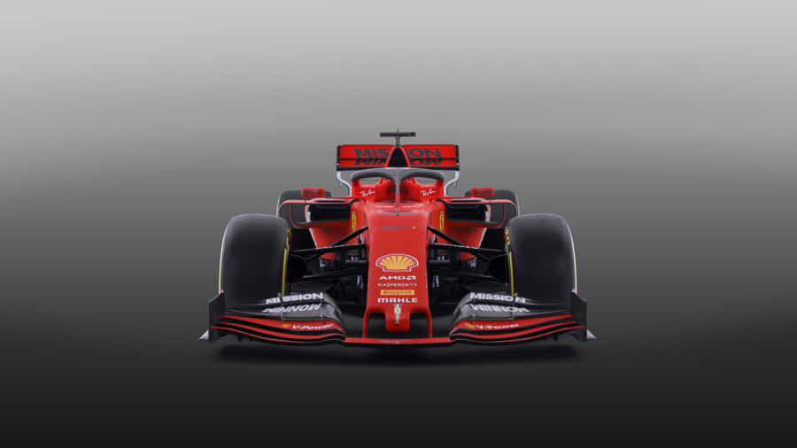 Ferrari F1 Car In Red On A Grey Background Wallpaper
