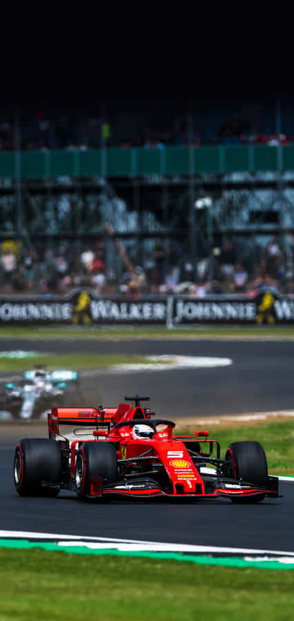 Ferrari F1 Car Ready To Take The Track Wallpaper